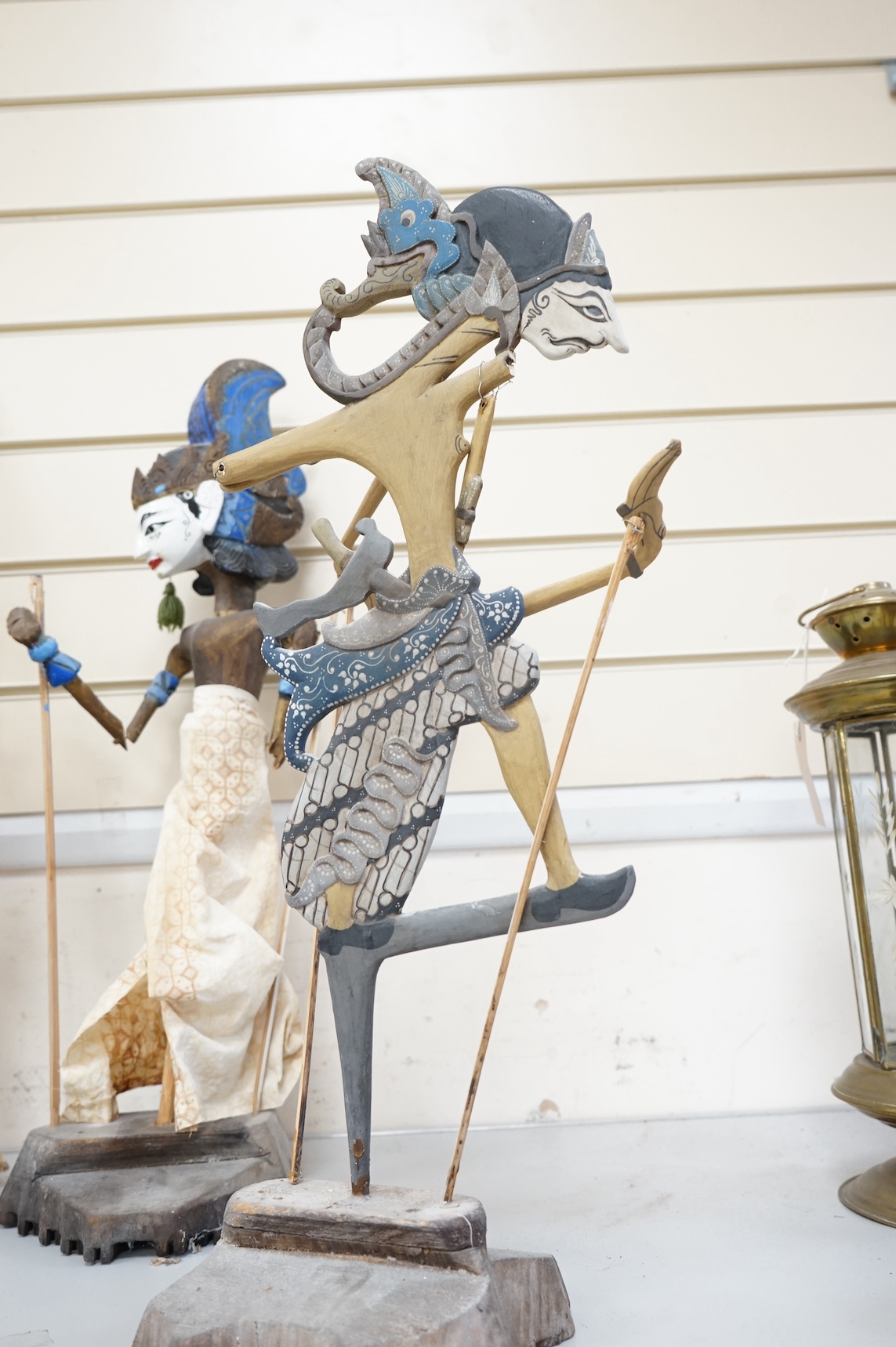 Three Thai carved wooden puppets and similar wooden puppet. Tallest 65cm high. Condition - fair